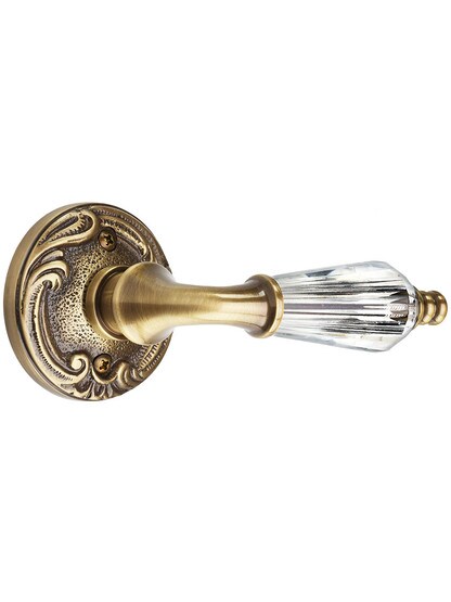 Lafayette Rosette Door Set with Crystal Lever Handles in Antique Brass.